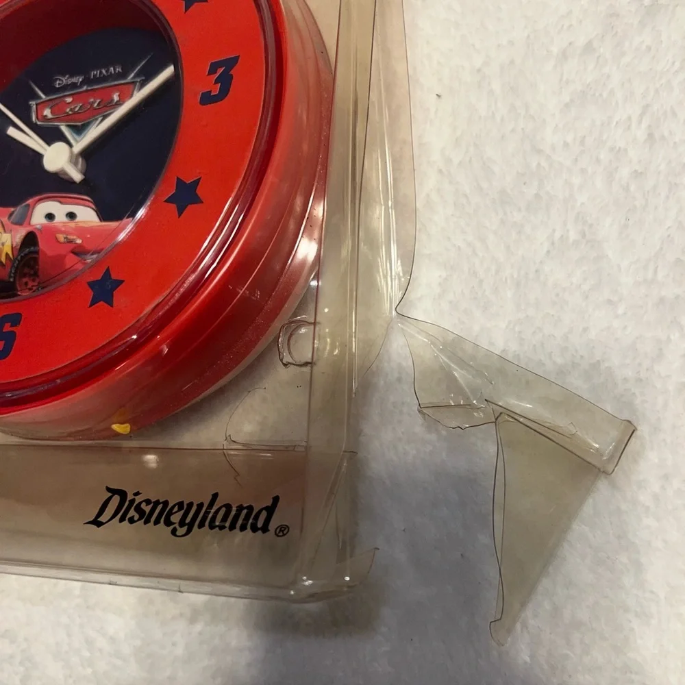 Disney’s Cars Clock, vintage, new in package but package is damaged
